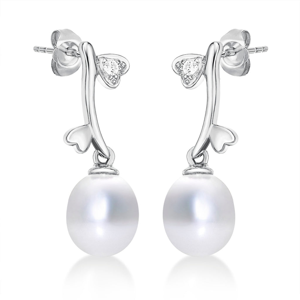 Side view of Pearl Drop Earrings with Cubic Zirconia Hearts in 9K White Gold