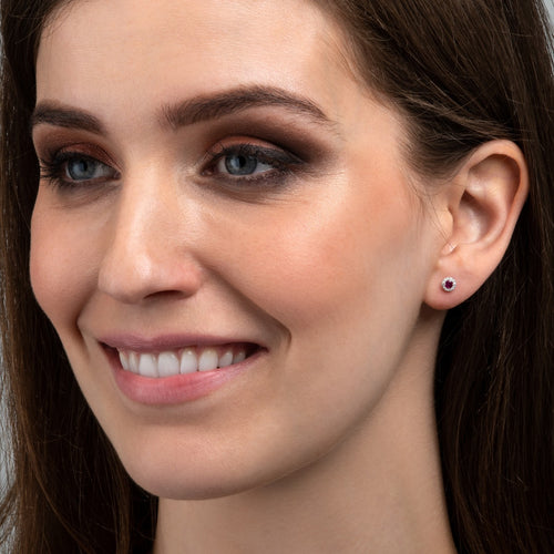 Small 9K White gold earrings with rubies