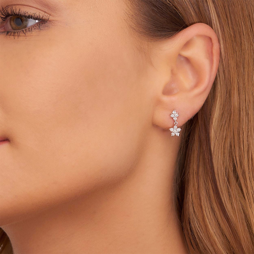 Flower drop 0.50ct diamond earrings in 18K white gold