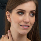 pink sapphire and diamond earrings in 9K yellow gold