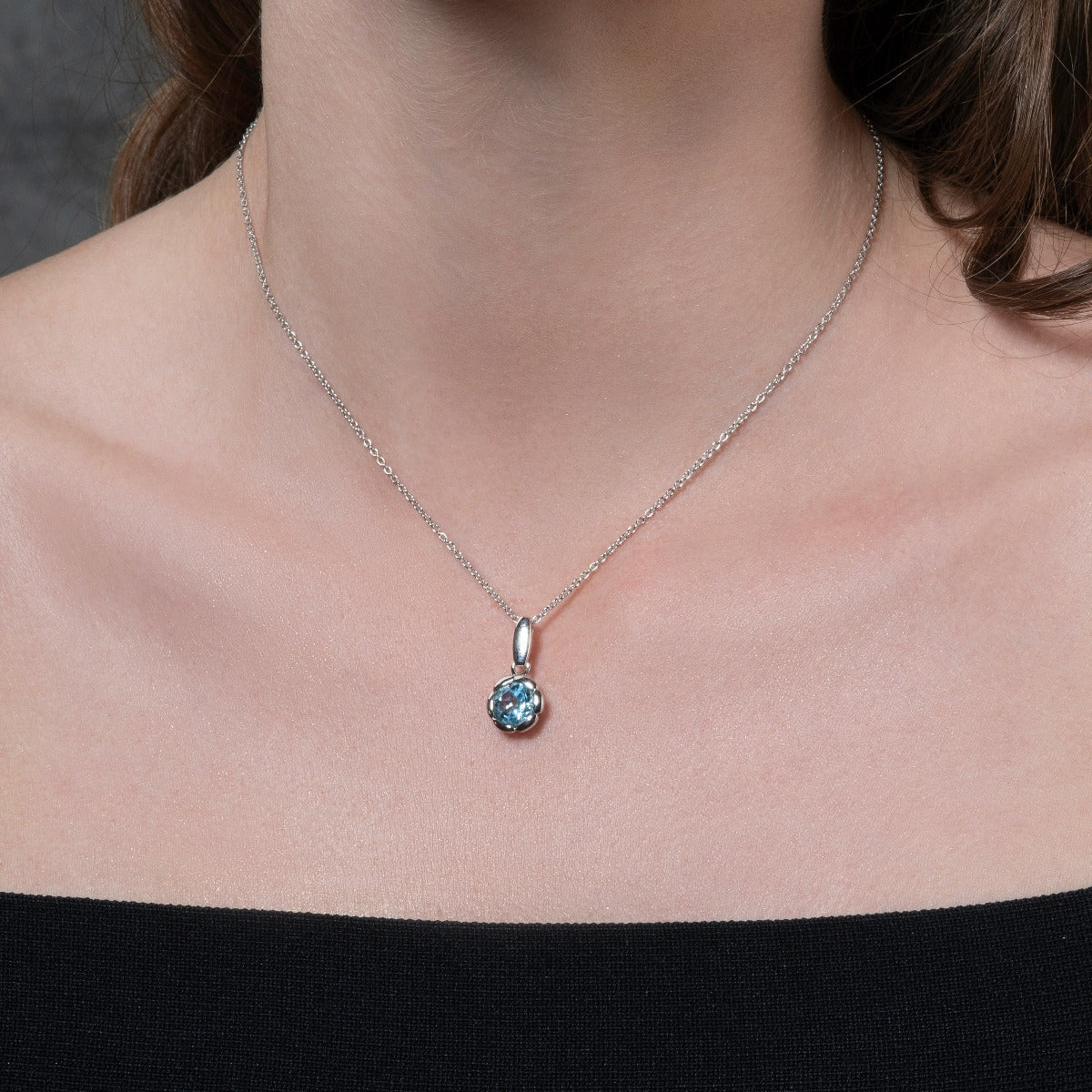 Round Blue Topaz Pendant Necklace in Sterling Silver