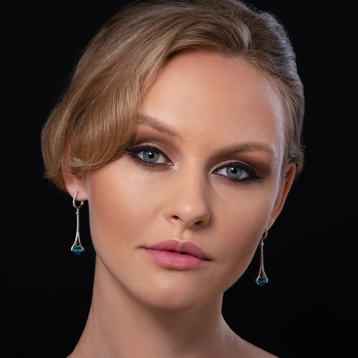 Sterling Silver Long Dangle Earrings with Light Blue Stones