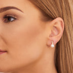 Freshwater pearl with 0.06ct diamond studs in 18K yellow gold
