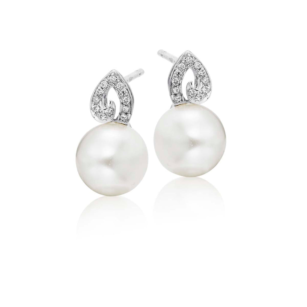 Freshwater pearl & diamond studs in 9K white gold