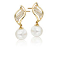 Freshwater pearl with 0.25ct diamond earrings in 18K yellow gold