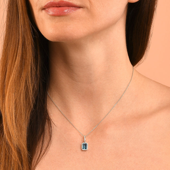 1.50ct Blue Topaz With 0.15ct Diamond Pendant In 9K White Gold