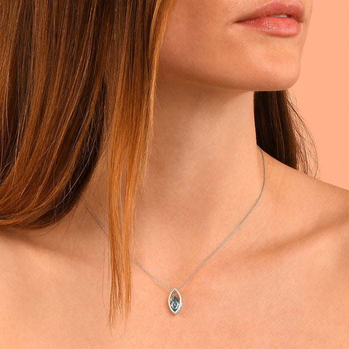 1.10ct Blue Topaz With 0.16ct Diamond Pendant In 9K White Gold