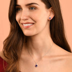 6mm x 6mm Amethyst and 0.16ct diamond stud earrings in 9K white gold