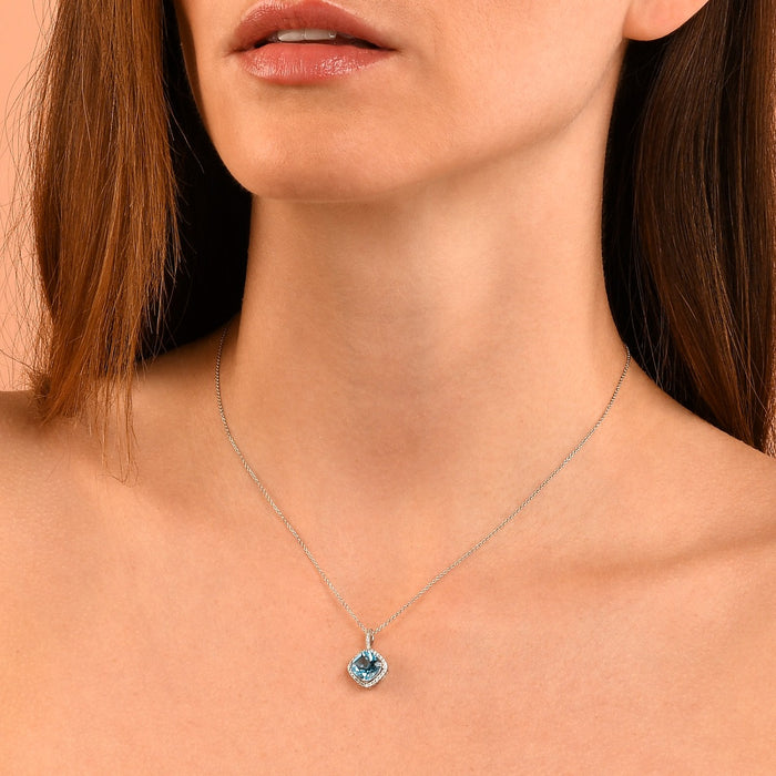2.50ct Blue Topaz With 0.14ct Diamond Pendant In 9K White Gold