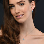 2.55ct Pear Blue Topaz With 0.05ct Diamond Pendant In 9K White Gold