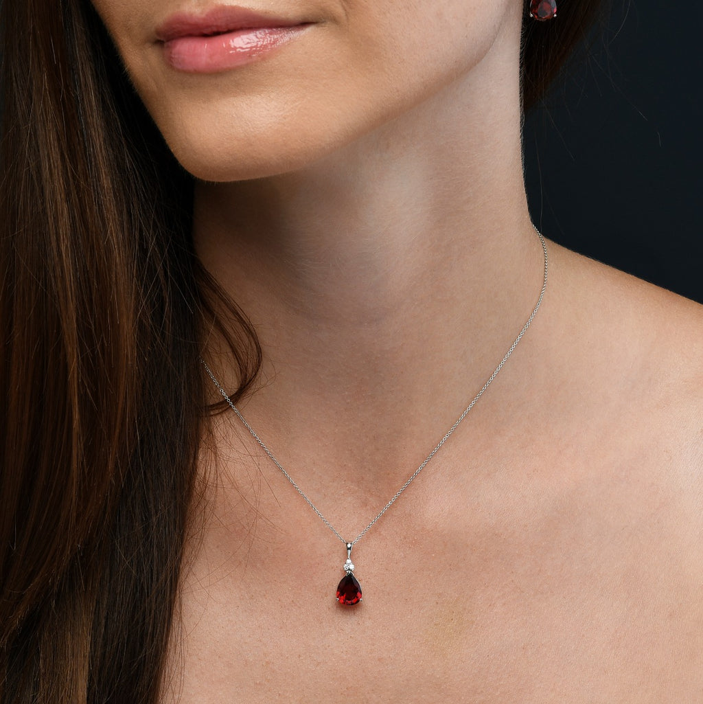 8mm x 10mm Pear Garnet with 0.05ct Diamond pendant in 9K white gold