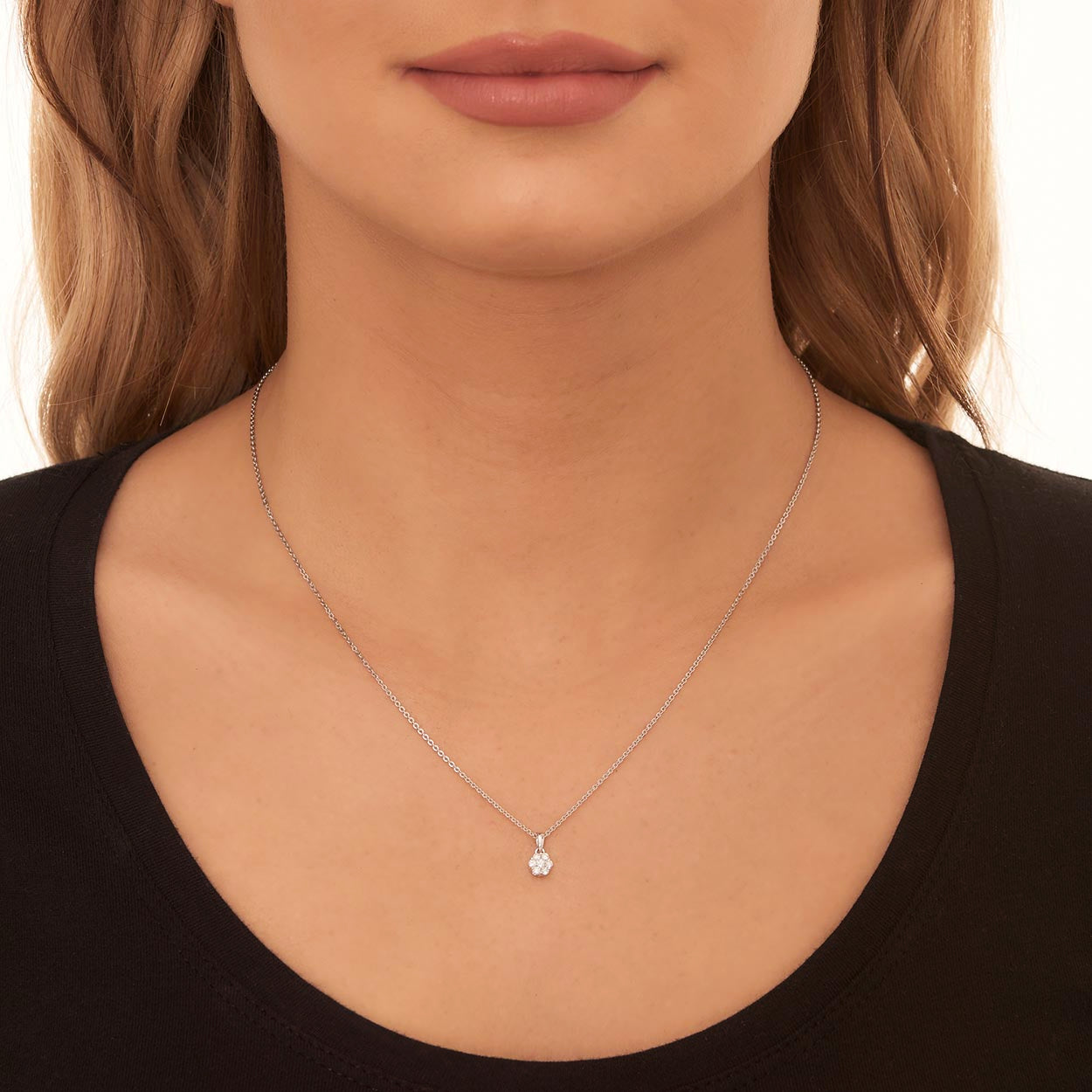 Flower shape 0.20ct cluster diamond pendant in 18K white gold