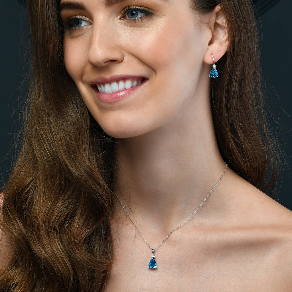 3.35ct Blue Topaz With 0.05ct Diamond Pendant In 9K White Gold