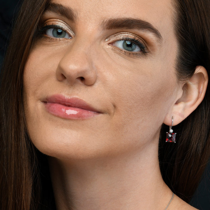 8.00ct Garnet And 0.06ct Diamond Earrings In 18K White Gold