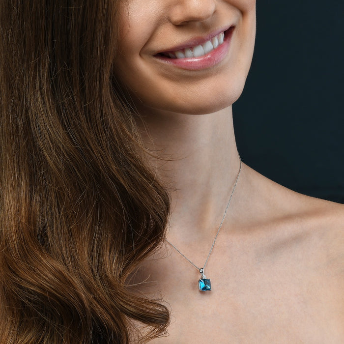 3.80ct Blue Topaz With 0.03ct Diamond Pendant In 9K White Gold