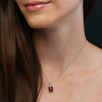 9mm x 9mm Garnet with 0.03ct Diamond pendant in 9K white gold