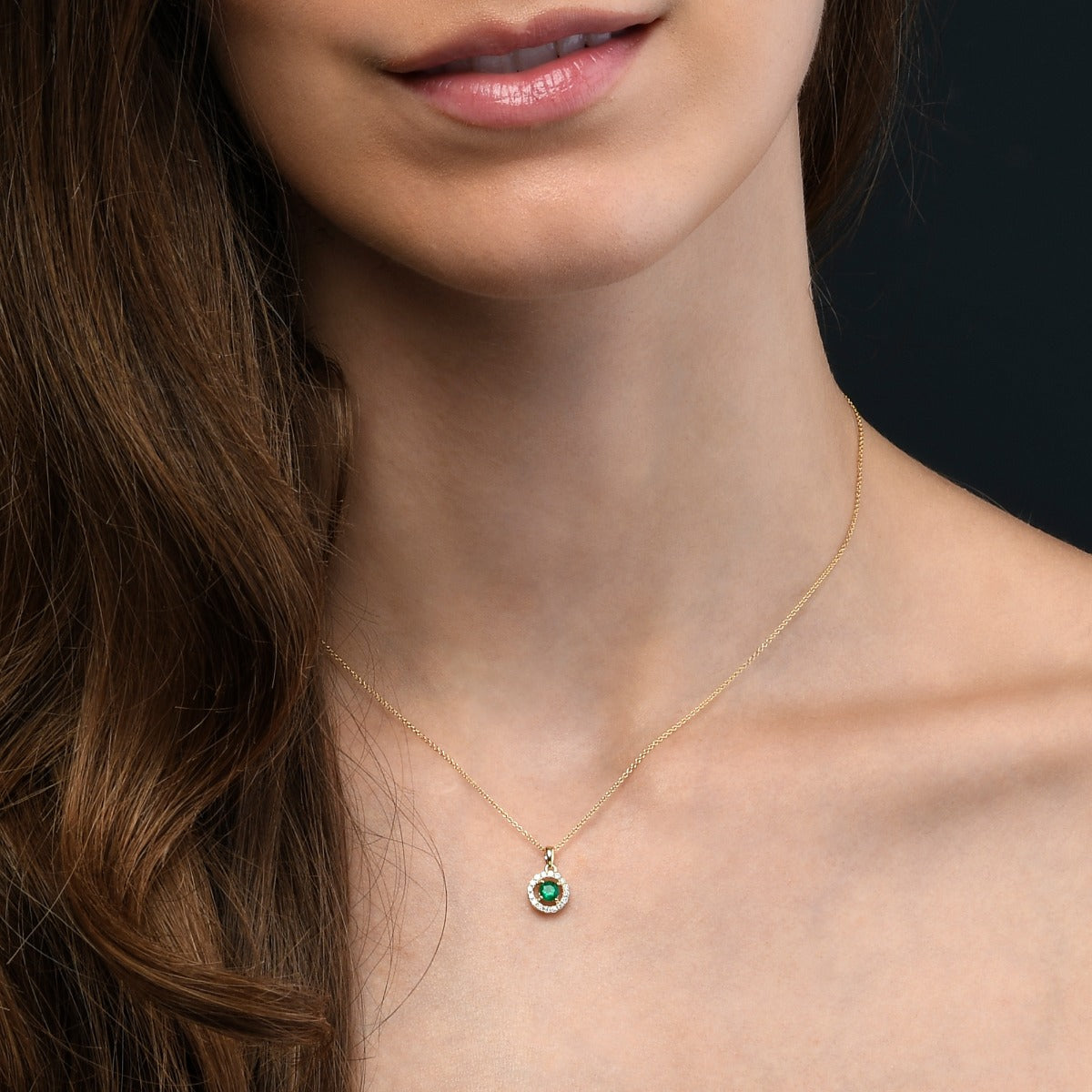 4mm Emerald and 0.14ct Diamond pendant necklace in 9K yellow gold