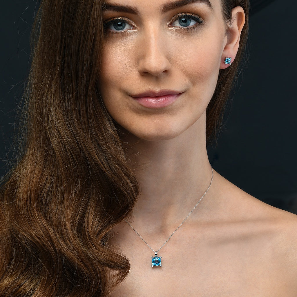4.05ct Cushion Blue Topaz With 0.03ct Diamond Pendant In 9K White Gold