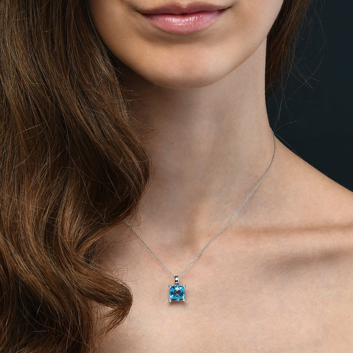 4.05ct Cushion Blue Topaz With 0.03ct Diamond Pendant In 9K White Gold