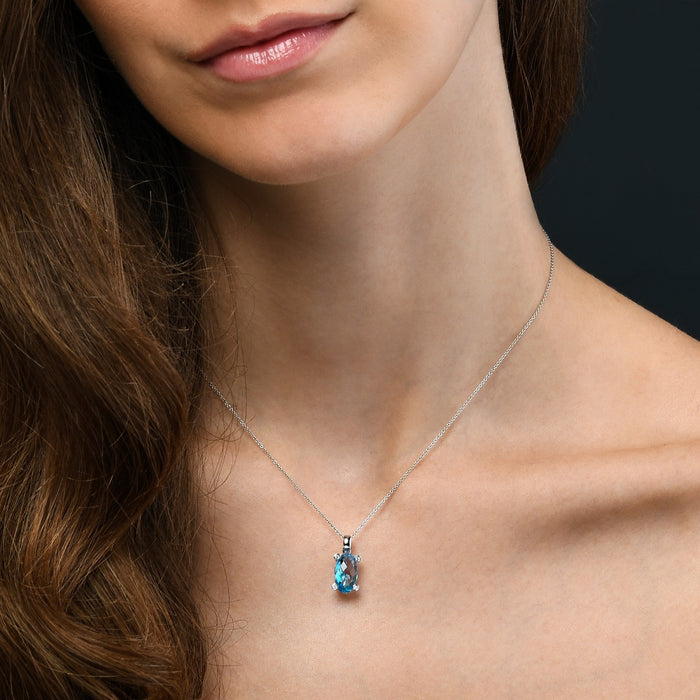 3.65ct Blue Topaz With 0.03ct Diamond Pendant In 9K White Gold