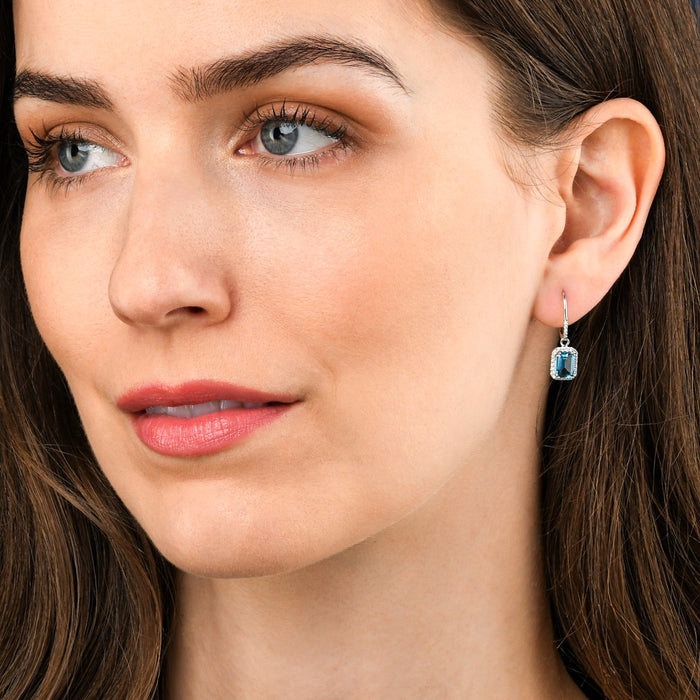2.70ct Blue Topaz And 0.20ct Diamond Earrings In 9K White Gold
