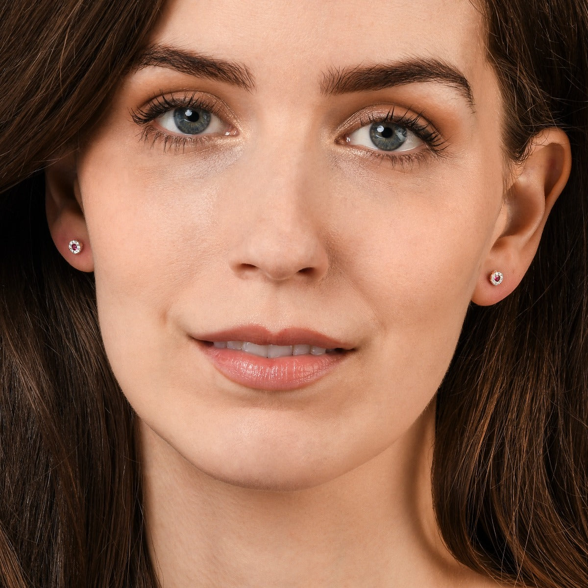 0.12ct Ruby Stud Earrings with Diamond Halo 9K White Gold