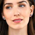 2.50ct Blue Topaz And 0.16ct Diamond Stud Earrings In 9K White Gold