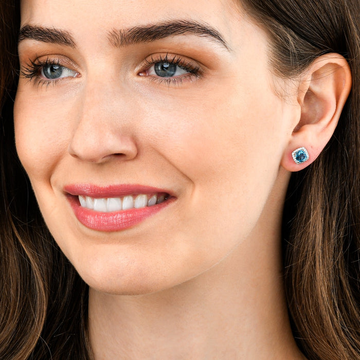 2.50ct Blue Topaz And 0.16ct Diamond Stud Earrings In 9K White Gold