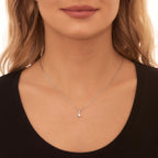 Solitaire 0.20ct tension set round diamond pendant in 18K white gold