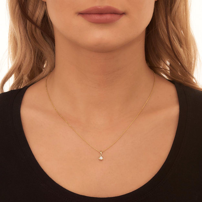 Solitaire 0.20ct Tension Set Round Diamond Pendant In 9K Yellow Gold