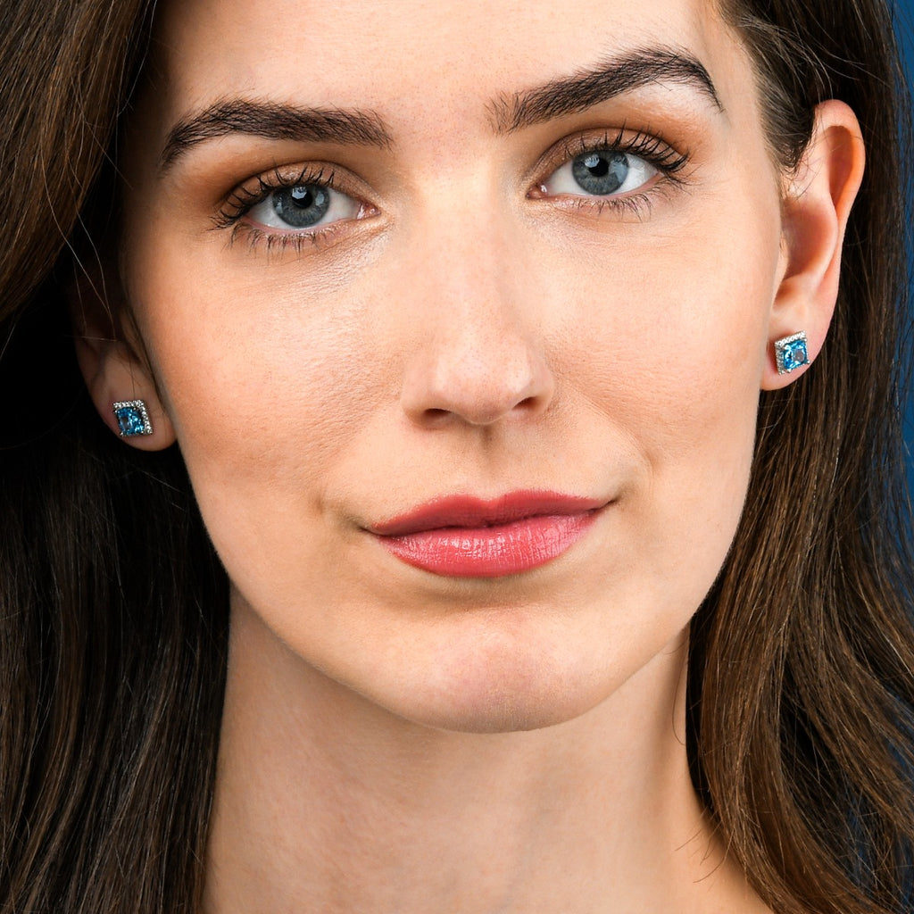 1.80ct Blue Topaz And 0.19ct Diamond Stud Earrings In 9K White Gold