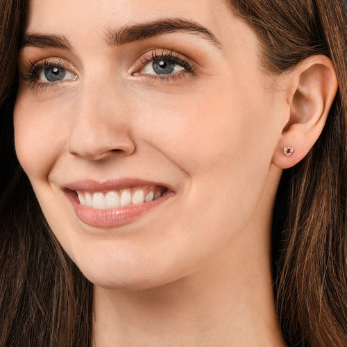 Tristar Ruby and 0.07ct diamond ear studs in 9K yellow gold