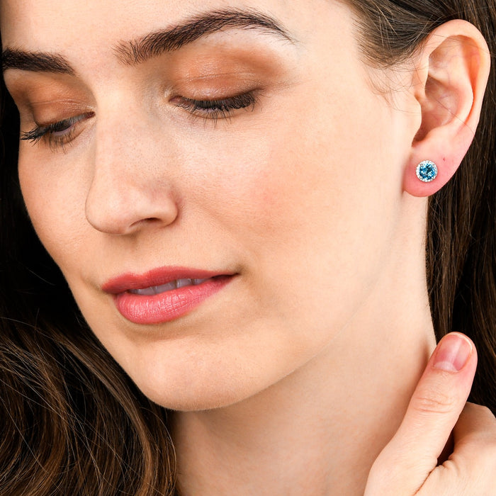 2.00ct Blue Topaz And 0.12ct Diamond Stud Earrings In 9K White Gold
