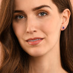 6mm Amethyst and 0.12ct diamond stud earrings in 18K white gold