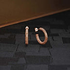 Rose Gold Plated Web Design 925 Sterling Silver Hoop Earrings on black surface