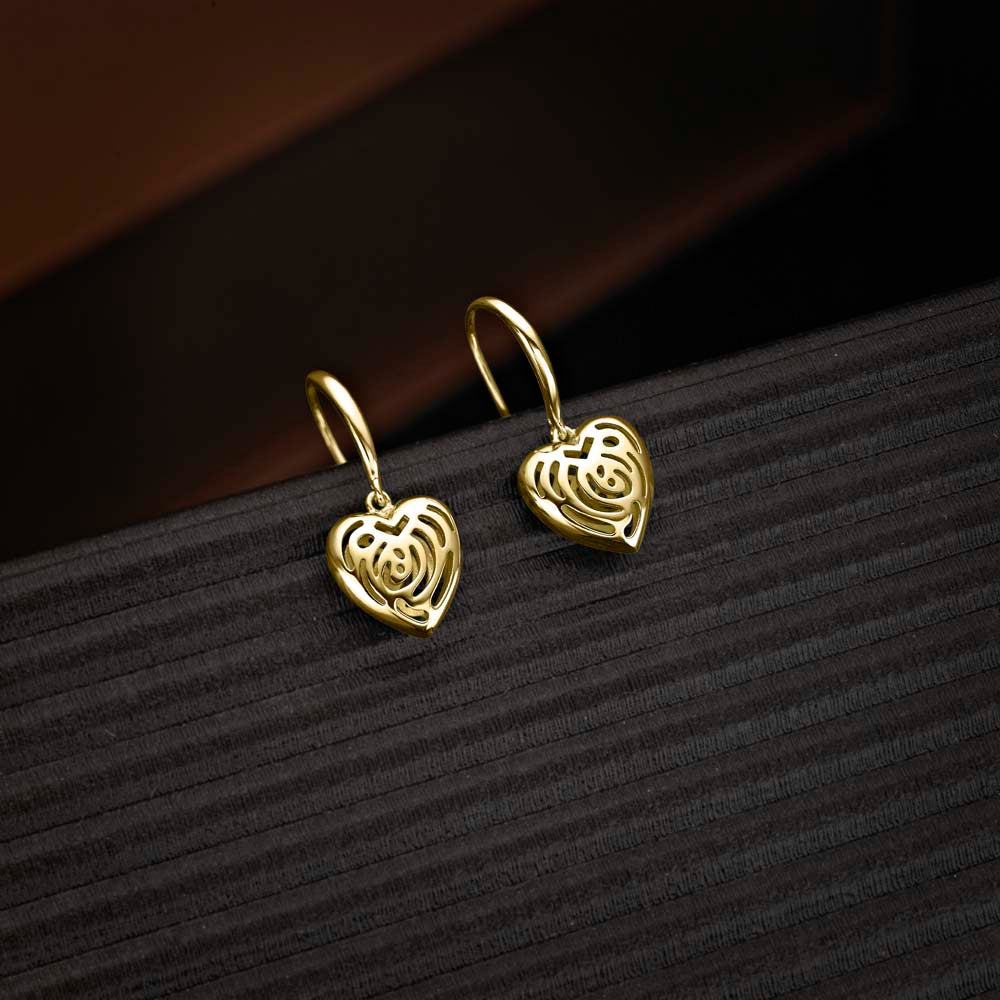 Gold Plated Dangling Heart 925 Sterling Silver Drop Earrings on black surface