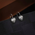Webbed Heart 925 Sterling Silver Drop Earrings on black surface