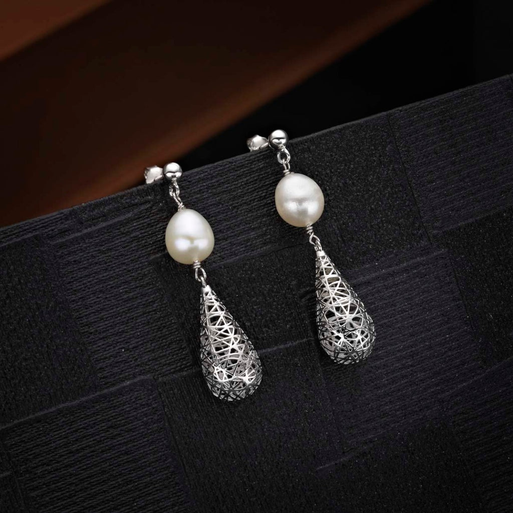 Vintage Conical Freshwater Pearl Earrings in 925 Sterling Silver on black surface