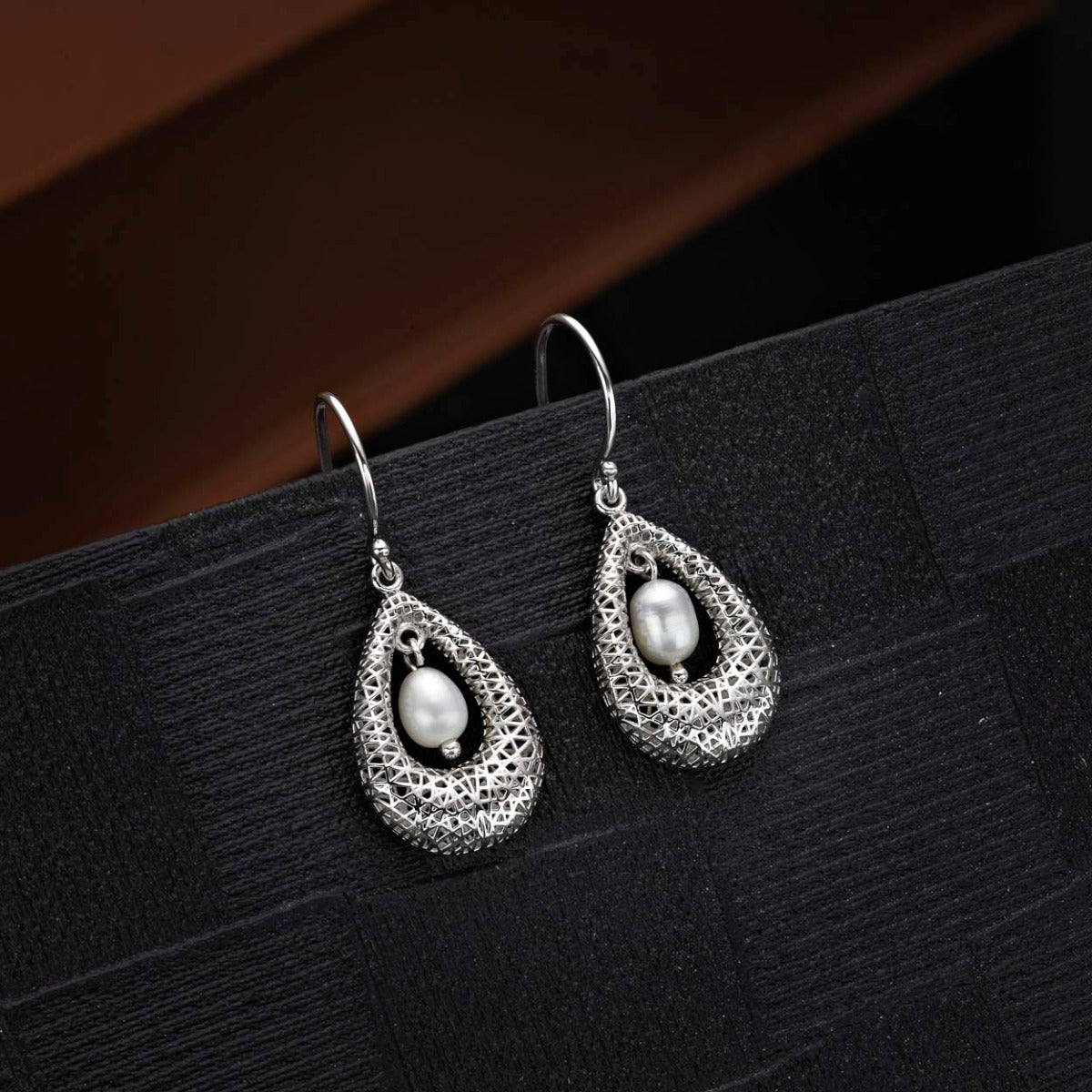Vintage Freshwater Pearl 925 Sterling Silver Dangling Earrings on black surface