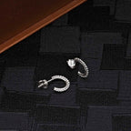Ball Edge Small 925 Sterling Silver Hoop Earrings on black surface