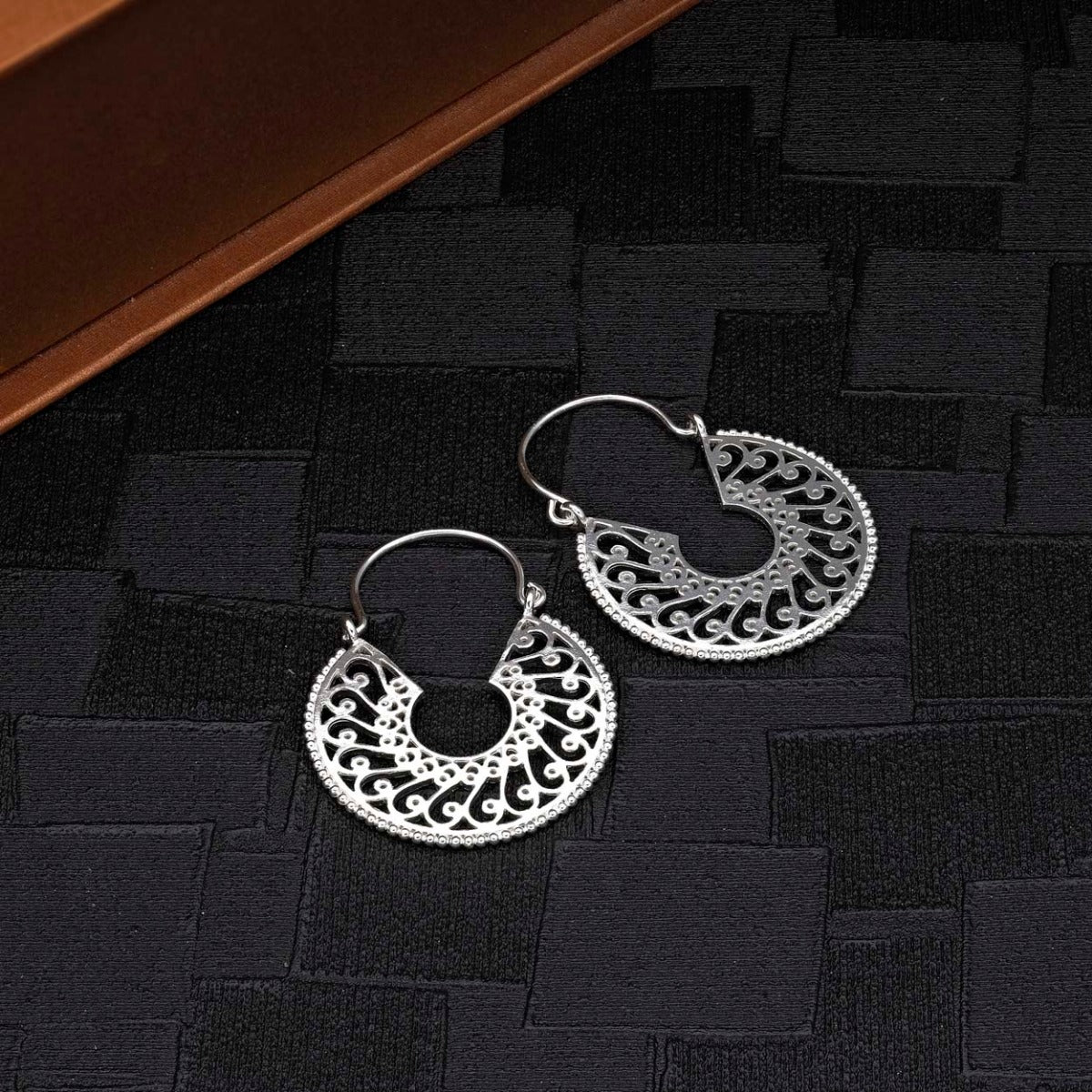 Intricate Design Vintage 925 Sterling Silver Hoop Earrings on black surface