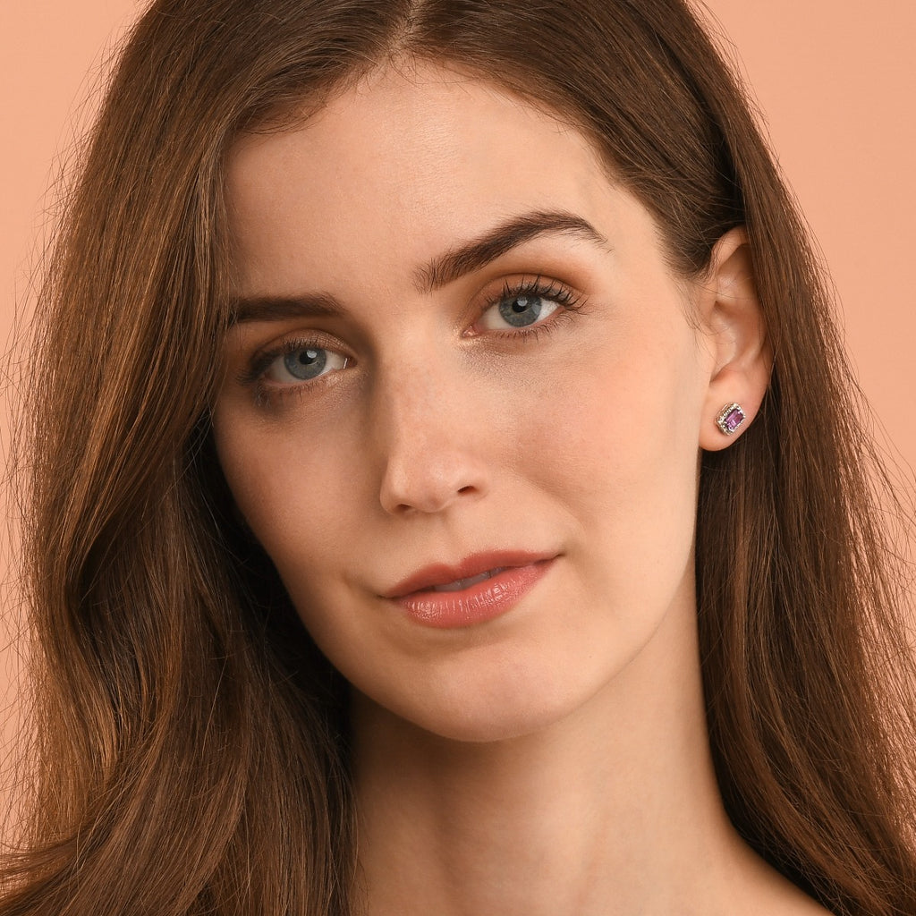 4mm x 6mm Amethyst and 0.15ct diamond stud earrings in 9K white gold 
