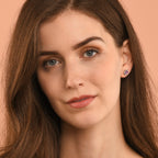 4mm x 6mm Amethyst and 0.15ct diamond stud earrings in 9K white gold 
