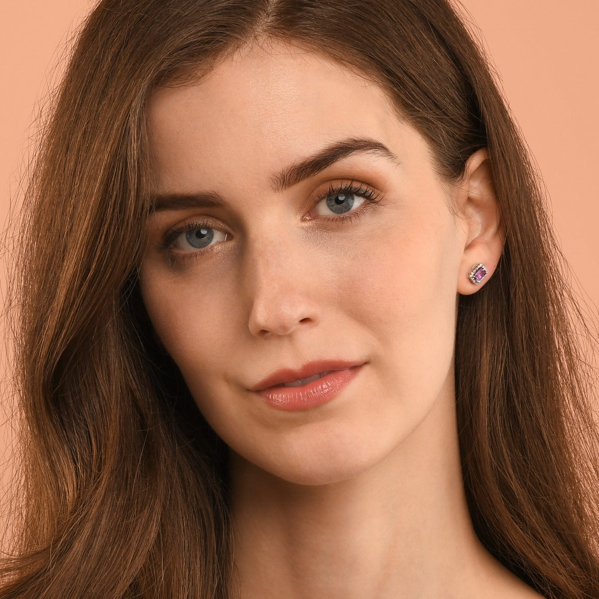 4mm x 6mm Amethyst and 0.15ct diamond stud earrings in 9K white gold 
