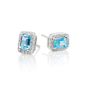 4mm x 6mm Blue Topaz and 0.15ct diamond stud earrings in 9K white gold
