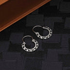Vintage 925 Sterling Silver Hoop Earrings on black surface