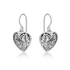 Side view of Swirling Heart 925 Sterling Silver Dangle Earrings