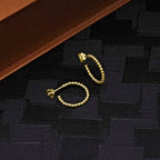 Beaded Design Gold Plated 925 Sterling Silver Hoop Earrings on black surface
