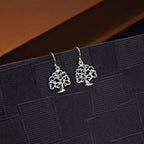 Tree of Life 925 Sterling Silver Dangle Earrings on black surface