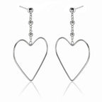 Hanging Heart Earrings in Sterling Silver side view
